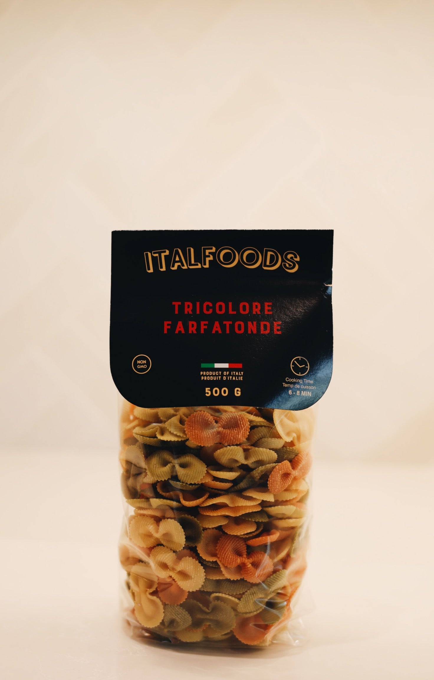 Packaged pasta with 'Italfoods' label on a beige background